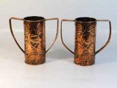 A pair of c.1900 double handled art nouveau copper