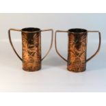 A pair of c.1900 double handled art nouveau copper