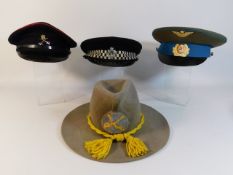 An Avon & Somerset Constabulary police cap, a Roya