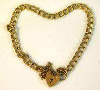 A 9ct gold bracelet with padlock, approx. 6.75in l