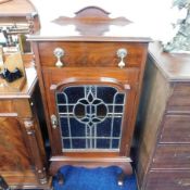 A 20thC. mahogany leaded glass cabinet with draw &