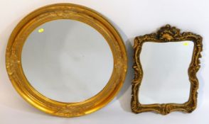 Two decorative reproduction mirrors, largest 25in
