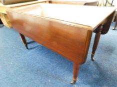 A 19thC. mahogany drop leaf table, 48in wide x 45.