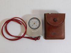 A vintage Suunto compass from Finland with leather