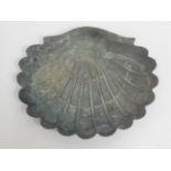 A shallow bronze scallop shell shaped bird bath, 1