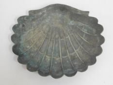A shallow bronze scallop shell shaped bird bath, 1