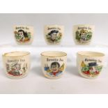 A set of six egg cups relating to the Jamaica Inn