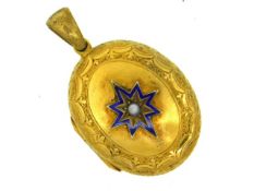 A yellow metal Victorian locket set with enamel &