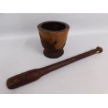 A wooden yam pounder & wooden mortar, 27in long, m