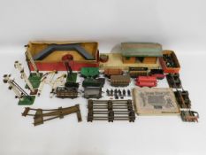 A quantity of O gauge railway accessories includin