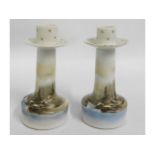 A pair of Japanese porcelain candle holders, 6.25i