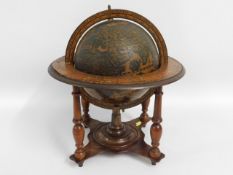 A mounted table globe, some losses to decor, 12.5i