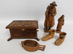 A selection of decorative wooden "tourist" wares
