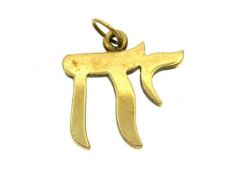 A 9ct gold pendant of possibly Asian or Oriental s
