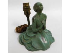 An art deco figurative spelter lamp base, lacking