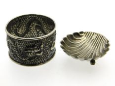 A white metal Oriental dragon napkin ring, tests a