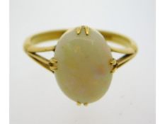 An 18ct gold ring set with opal, 3.4g, size Q