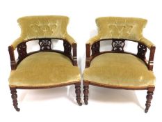 A pair of upholstered antique nursing chairs