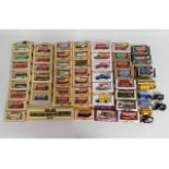 Forty eight boxed diecast buses & lorries includin