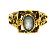 An antique "made up" ring set with aquamarine ston