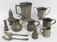 A Victorian pewter quart twinned with other pewter