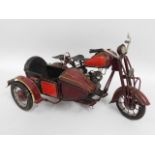 A scale model of a motorcycle & sidecar, 15in long