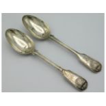A pair of 1836 William IV London silver table spoons by William Eaton with Kings pattern style decor
