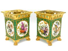 A pair of 19thC. Paris porcelain lidded bulb pots, each with gilded decor & four hand painted panels