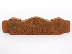 A carved walnut plaque "Sharron-119" believed to have connection to the Australian air force, 22.125