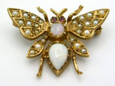 A 9ct gold moth brooch set with opal, pearl & small pink stones for eyes, 26mm wide, 3.7g