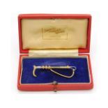 A 1965 9ct two colour gold riding crop stock pin with its Swaine, Adeney & Brigg box, 50mm long, 4.2