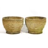A pair of reconstituted stone planters, 13.5in diameter x 9.5in high