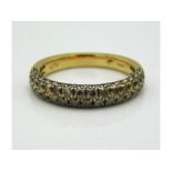 An 18ct gold Mappin & Webb ring set with approx. 0.4ct champagne coloured diamonds, 3.4g, size L/M