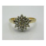 A 9ct gold cluster ring set with approx. 0.28ct small diamonds, 2.5g, size P