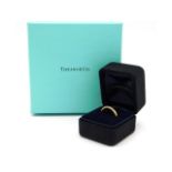 A Tiffany & Co. 18ct gold wedding band, with box & original outer box, size L, 3.2g