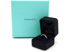 A Tiffany & Co. 18ct gold wedding band, with box & original outer box, size L, 3.2g