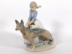 A Lladro porcelain girl with German Shepherd dog, "Not So Fast", unboxed, 8in tall