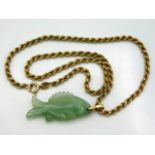 A 9ct gold rope chain with Chinese jade fish pendant, fish measures 35mm wide, necklace 14in long, g