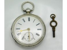 A 1902 William Ehrhardt Ltd silver cased English lever pocket watch with key, case 51mm diameter, 10