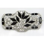 A 1920s art deco white gold diamond & onyx brooch, approx. 63mm x 32mm, tests electronically as 18ct