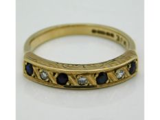 A 9ct gold diamond & sapphire ring, 2.4g, size L/M