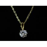 A 9ct gold chain & pendant with white paste stone, 16in long, 1.7g