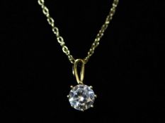 A 9ct gold chain & pendant with white paste stone, 16in long, 1.7g