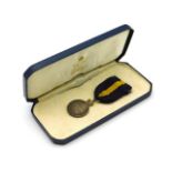 A Royal Warrant Holders Association medal awarded to S. C. Patey Esq