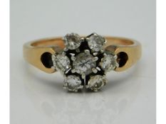 A 14ct gold ring set with seven diamonds of approx. 0.57ct, t, 3.5g, size N