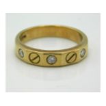 A 9ct gold ring set with approx. 0.17ct of diamond, 4.3g, size O