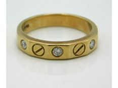 A 9ct gold ring set with approx. 0.17ct of diamond, 4.3g, size O