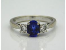 An 18ct white gold tanzanite & diamond ring, approx. 0.3ct diamond, 4.2g, size M/N