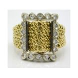 An 18ct gold two colour gold ring set with approx. 0.54ct diamond, 8g, size Q/R