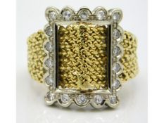 An 18ct gold two colour gold ring set with approx. 0.54ct diamond, 8g, size Q/R